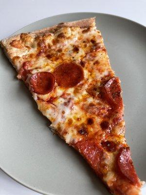 a slice of pepperoni pizza