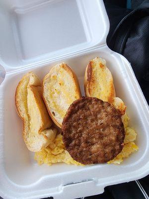 Huevos, salchichha, y tostadas