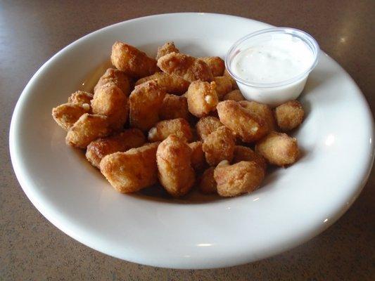 Jalapeno cheese curds with dipping sauce.