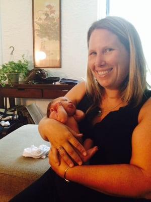 Megan and my five day old baby, Naima. Megan is an amazing doula. We were so lucky to have her. THANK YOU!