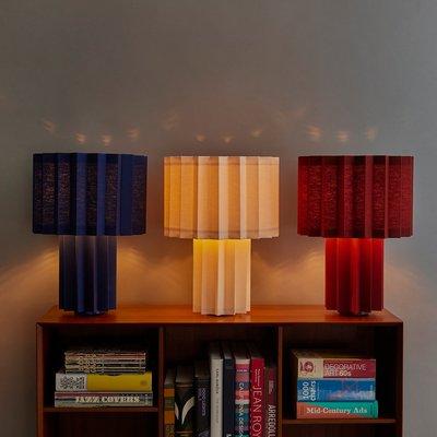 The 'Plissé' table lamp by Folkform for Orsjo, in blue, white, and burgundy. In stock and wired for US.