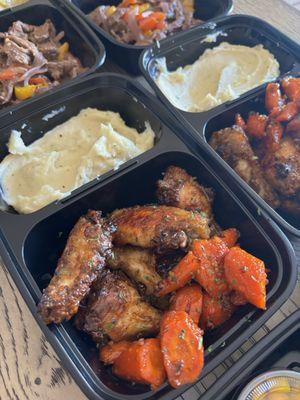 Honey jerk chicken wings with mashed potatoes & honey roasted carrots