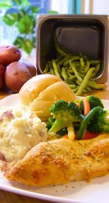 Parmesan Garlic Chicken Breast with garlic red skin mashed potatoes and tuscan vegetable blend.