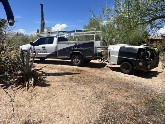 Hydrojet trailer attached to Zippity truck.