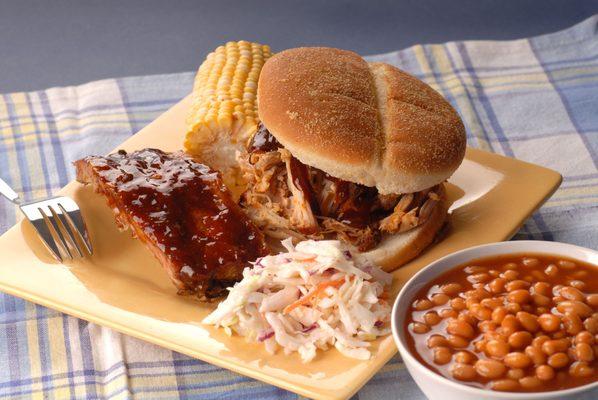 Pulled prork, ribs, baked beans, hand cut slaw, corn