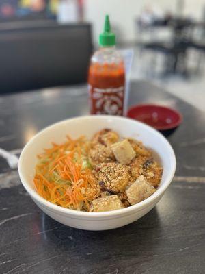 Delicious Shrimp and spring rolls over vermicelli noodles