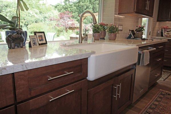 Taj Mahal quartzite kitchen with farm sink. Contractor Gary Woods.