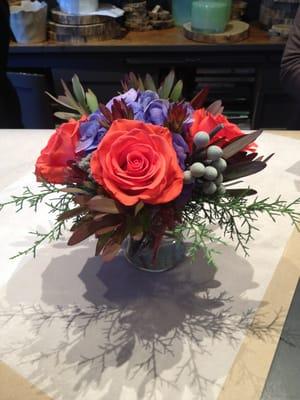 Gorgeous bright fall arrangement. Roses and hydrangea. Brava!