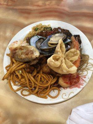 Just a plate of random food items from the buffet