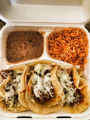 3 taco plate; asada with only cheese and hot salsa with retried beans and rice.