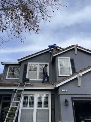 Our crew performing a downspout check.