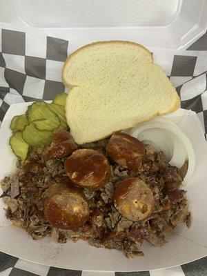 Charlie Duke - a boat of beans topped with your choice of meat , our homemade bbq sauce, pickles, onions, and a slice of bread