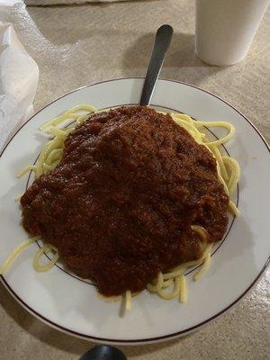 Kids spaghetti with meatball (covered in the middle)