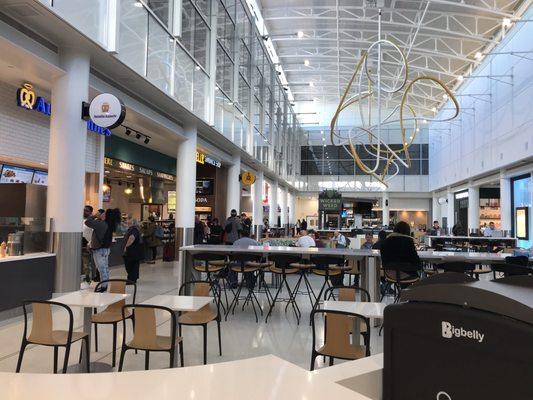 Nice new food court and shopping area near the E & D gates. Potbelly's, Auntie Anne's, Wicked Weed Brewing Bar, Shake Shack, Bojangles.