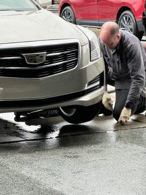 In front of the Pick up area where the wheels came off half way