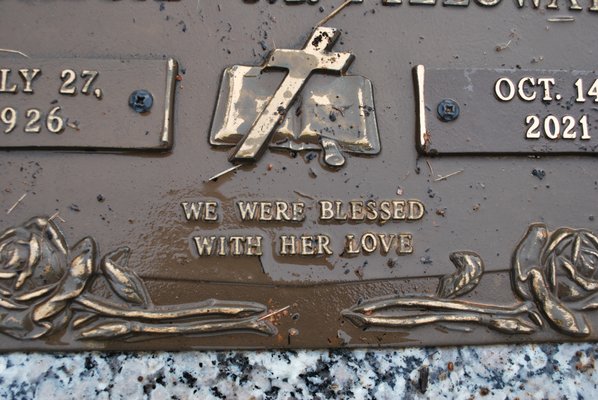 Mom's plaque after being buried in sand/mud for months!