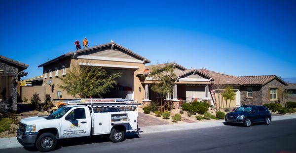 Robco crew on job site, Henderson NV, flat tile roof solar install