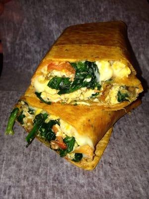 Veggie breakfast wrap with hashbrown patty