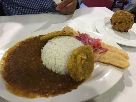 Fried sea bass with rice and tostones