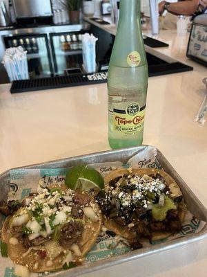 Carne asada taco and carnitas taco - both excellent.