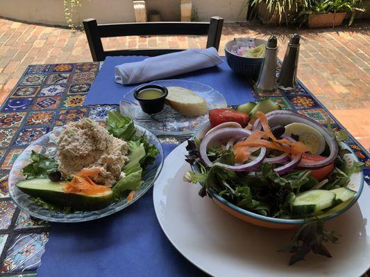 Garden salad, homemade Basalmic dressing, sourdough bread, a side of tuna salad and a house made pickle.