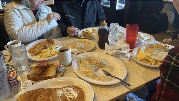 Pancakes, biscuits and gravy, recession proof breakfast, coffee (always filled before empty and hot), and sourdough toast.