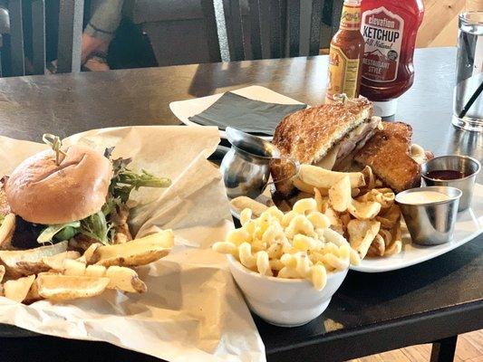 From left to right: chicken club with fries, side of Mac and cheese, monte Cristo with fries