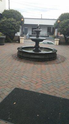 Beautiful fountain in courtyard of Mississippi Court Apartments