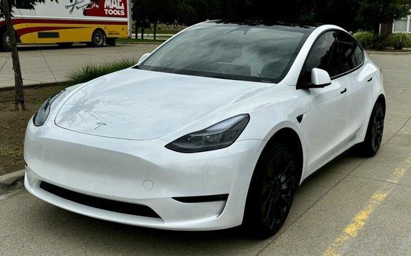 Tesla Model Y Performance with ceramic coating, tint and PPF.