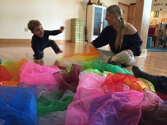 Parent and child having fun while supporting development in a music therapy class!