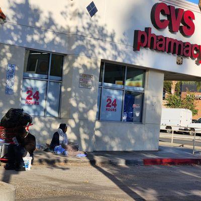 Transients/vagrants loitering outside the store!