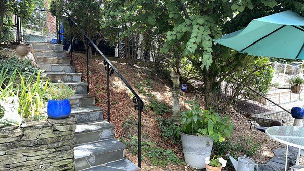 Stairway renewed with flagstone veneer.