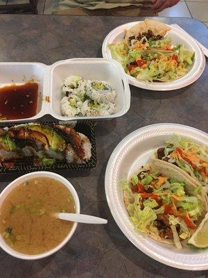 Snake roll, veggie tempura roll, spicy pork, chicken and beef tacos, miso soup.