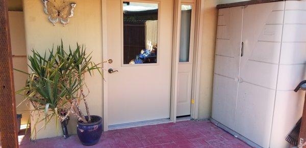 Replacement of sliding glass door for wheelchair accessible patio.