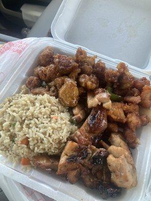 This is the 3 item, combo - Rice, bourbon chicken, black pepper chicken, and hot spicy chicken.