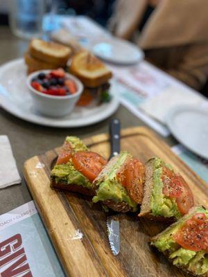 Avocado toast (front) and vegan roadhouse stack (back)