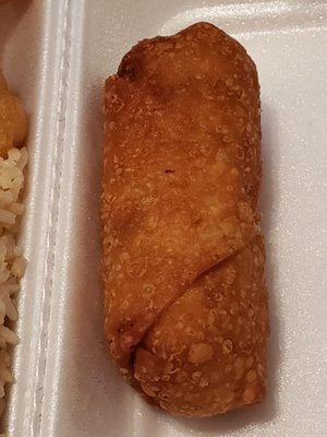 Egg roll that comes with the Happy Family Combination plate.