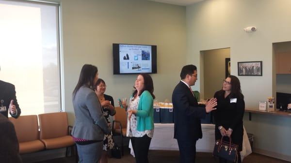 Dr. Mulhern and Dr. Ruit speaking with guests at our Open House