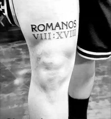 ROMANOS taken from a bible font and tattooed with fine line Roman numerals