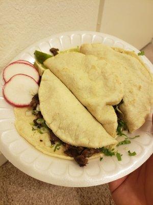 Hard to see the inside [asada] but those tortillas are soooooo good!