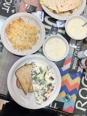 Veggie omelet, hash browns, creamy grits