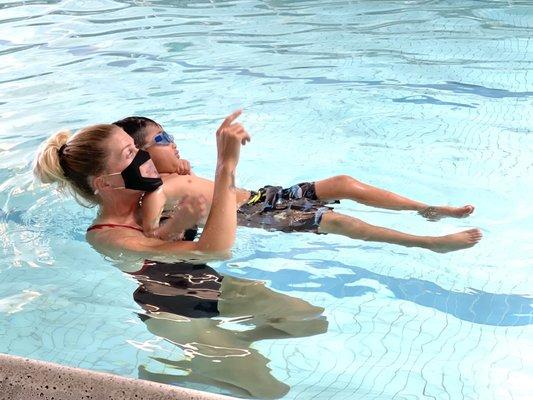 Coach Samantha is awesome with kids, seen here with our 4-year old.