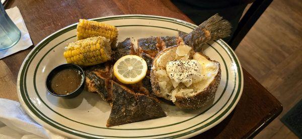 Fried grouper with baked potato and corn