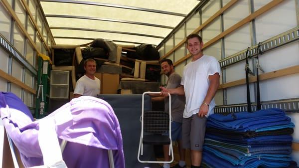 Very hard working Serge, Charlie and Paul strategically loading the moving truck to make sure it all fit!