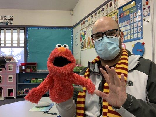 David and Elmo entertaining the class