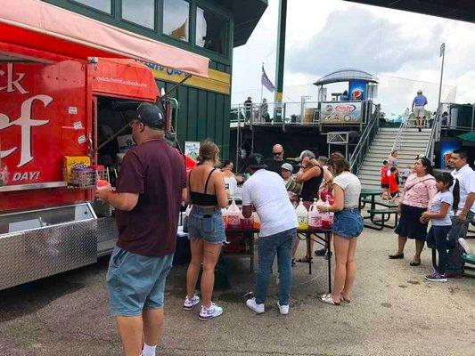 Quick Chef Inc. food truck at the Madison Mallards Stadium.