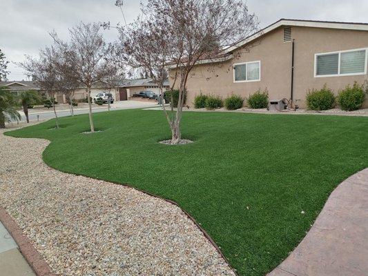 Artificial grass and decorative rock