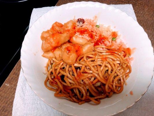 This is half of the sweet-and-sour chicken with fried rice and vegetable lo mein.