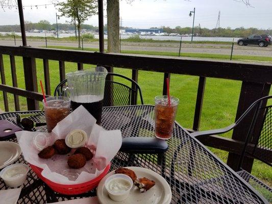 Jalapeno poppers and 2 Cokes.  View across the street towards the water and marinas.