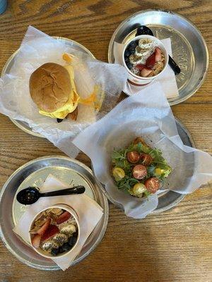 Caramelized bacon sandwich, açaí bowl, avocado toast